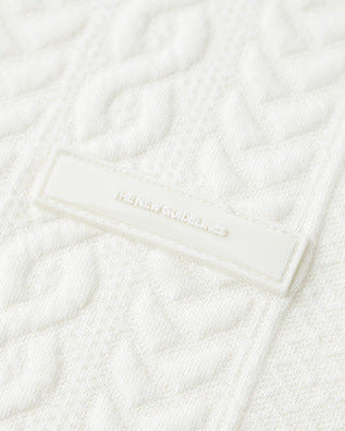 Kabelstickad tröja med texturerad väv