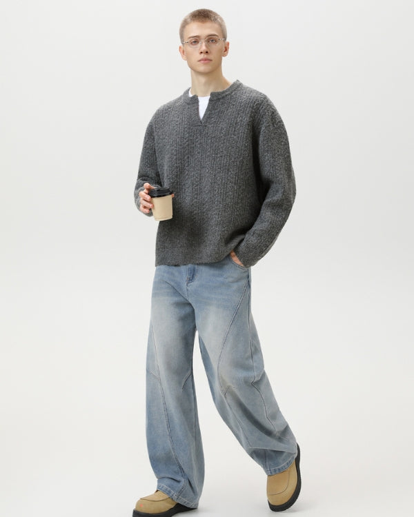 Kabelstickad tröja med notchhals