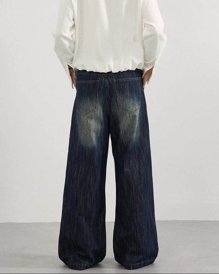 The Whisper Fade Pleated Jeans